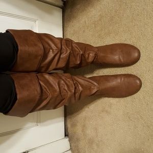Brown leather knee high boots